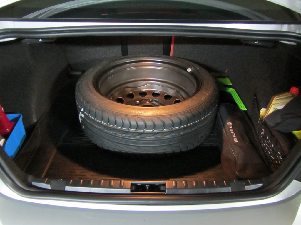 Name:  spare tire trunk.jpg
Views: 7284
Size:  156.1 KB